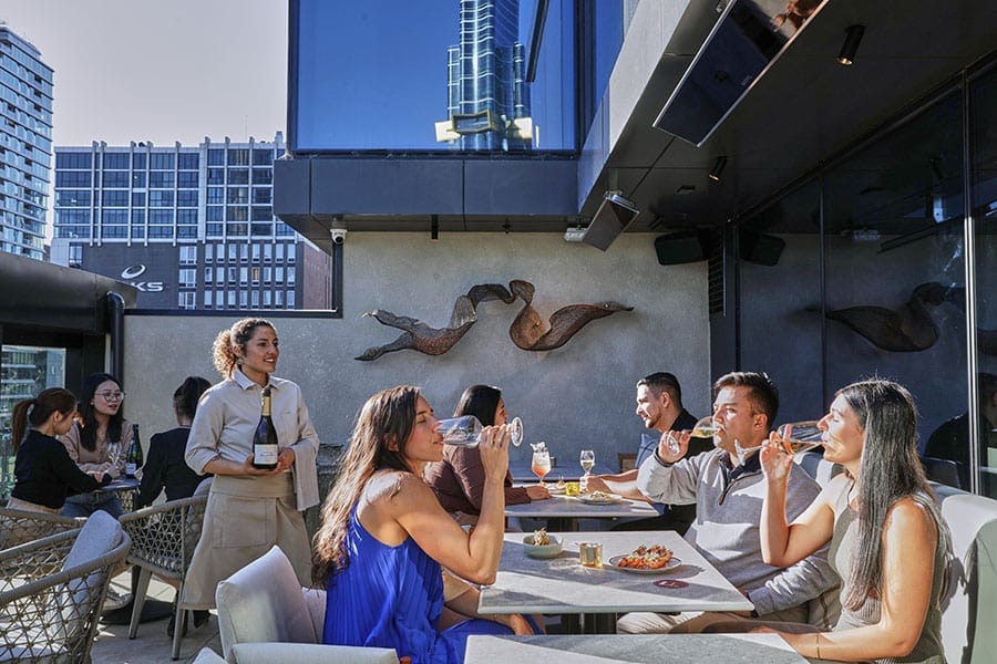 Outdoor terrace seating at Fleet Rooftop Bar
